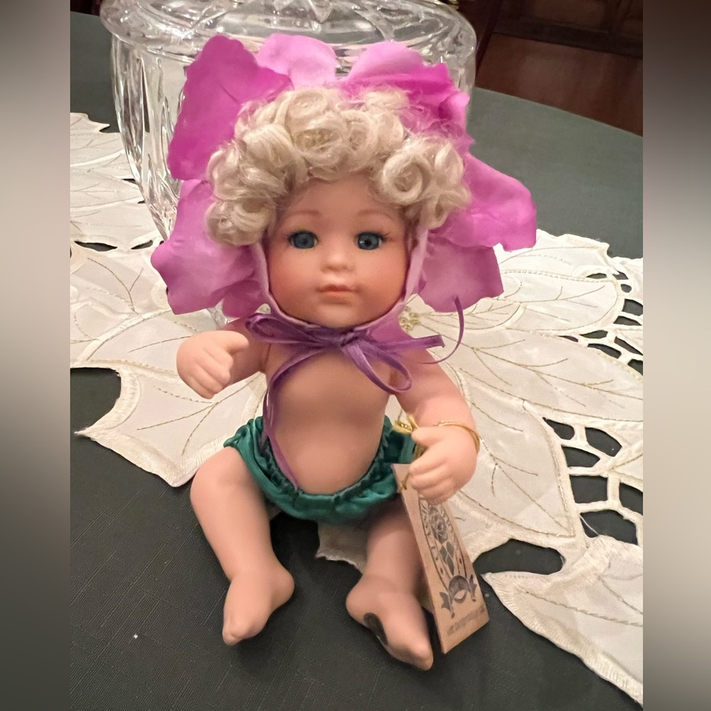 Classic Creations Floral Baby hand crafted jointed porcelain doll